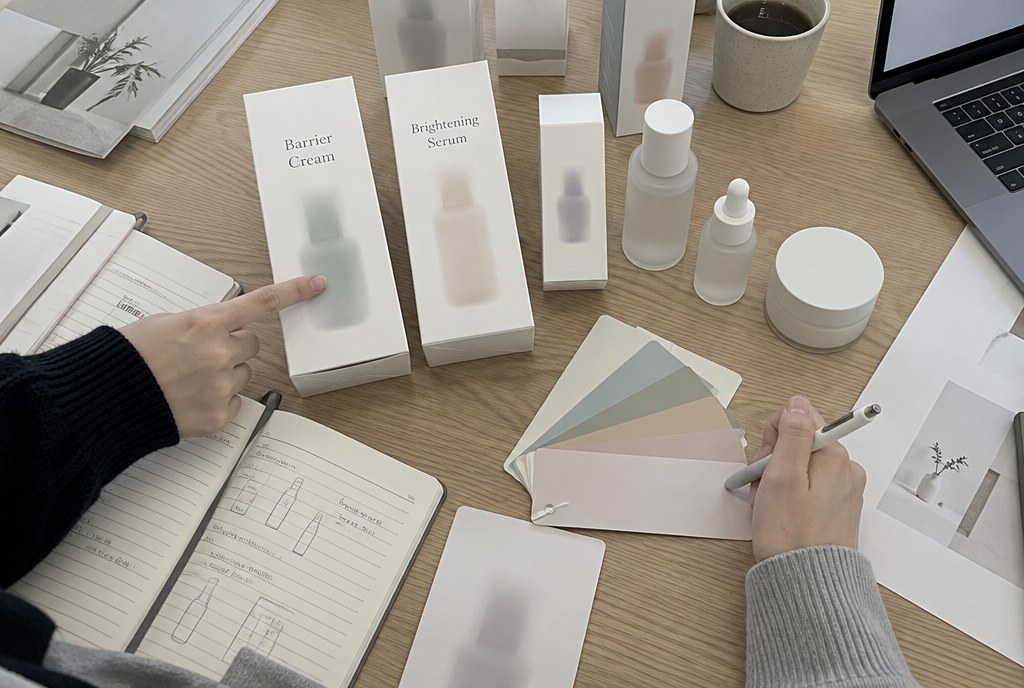 Reviewing samples and packaging proofs with a client brief